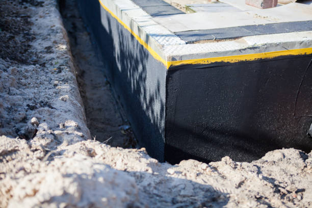 Professional Waterproofing technician working in Munster, IN